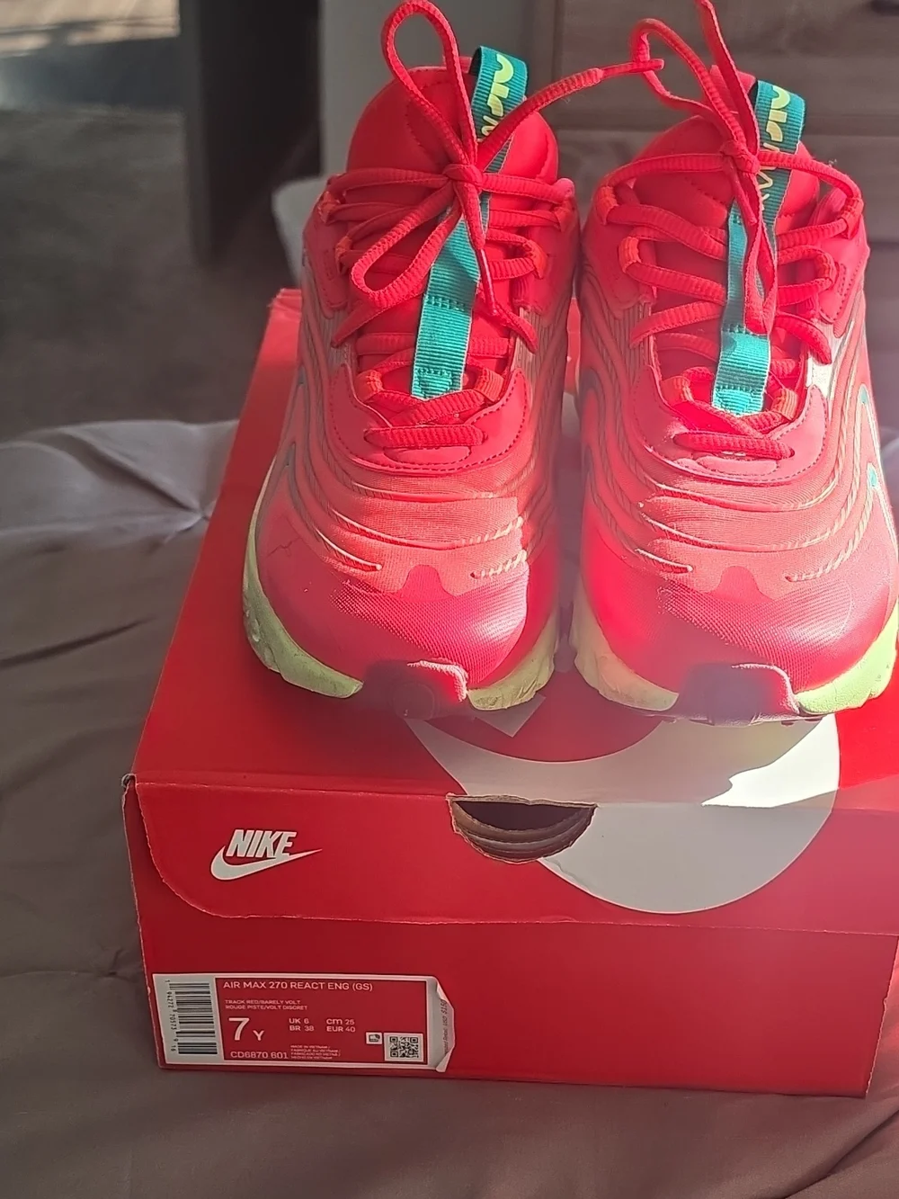 Nike Kids Red Sneakers with Teal Tongue Detail